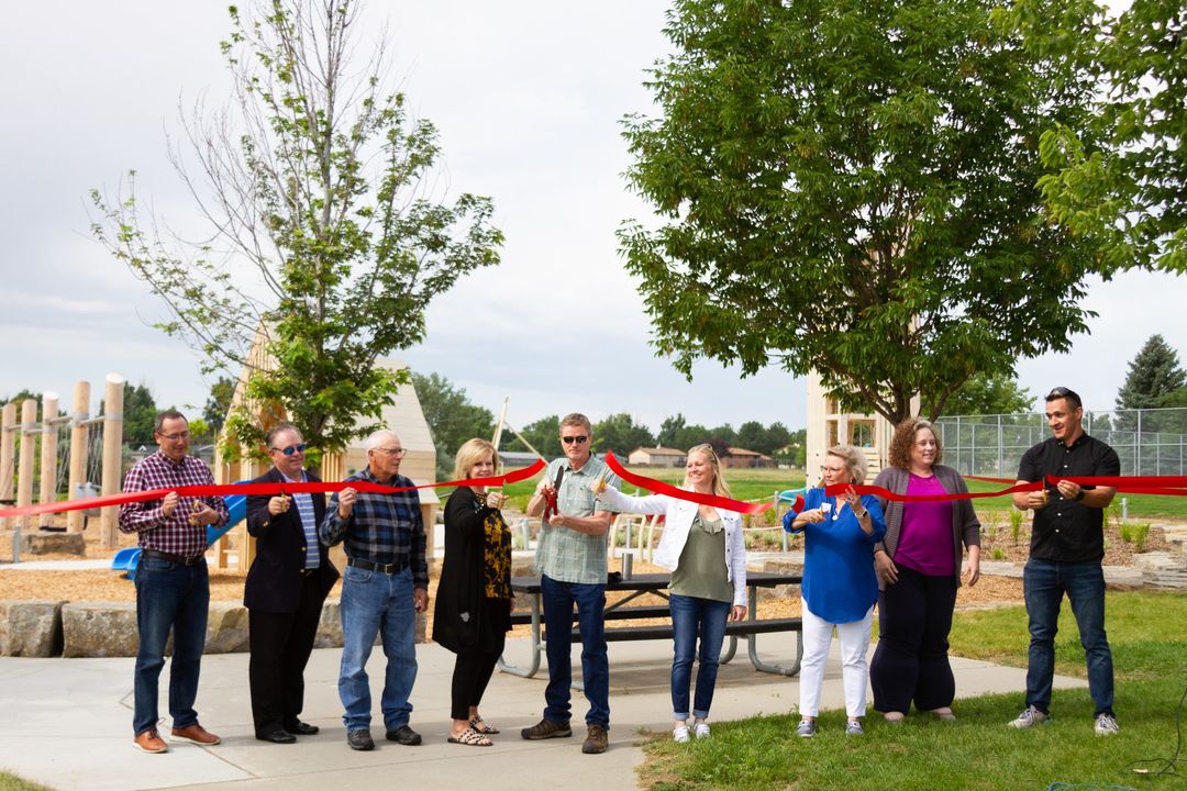 City officials and community leaders participate in the ribbon cutting ceremony 